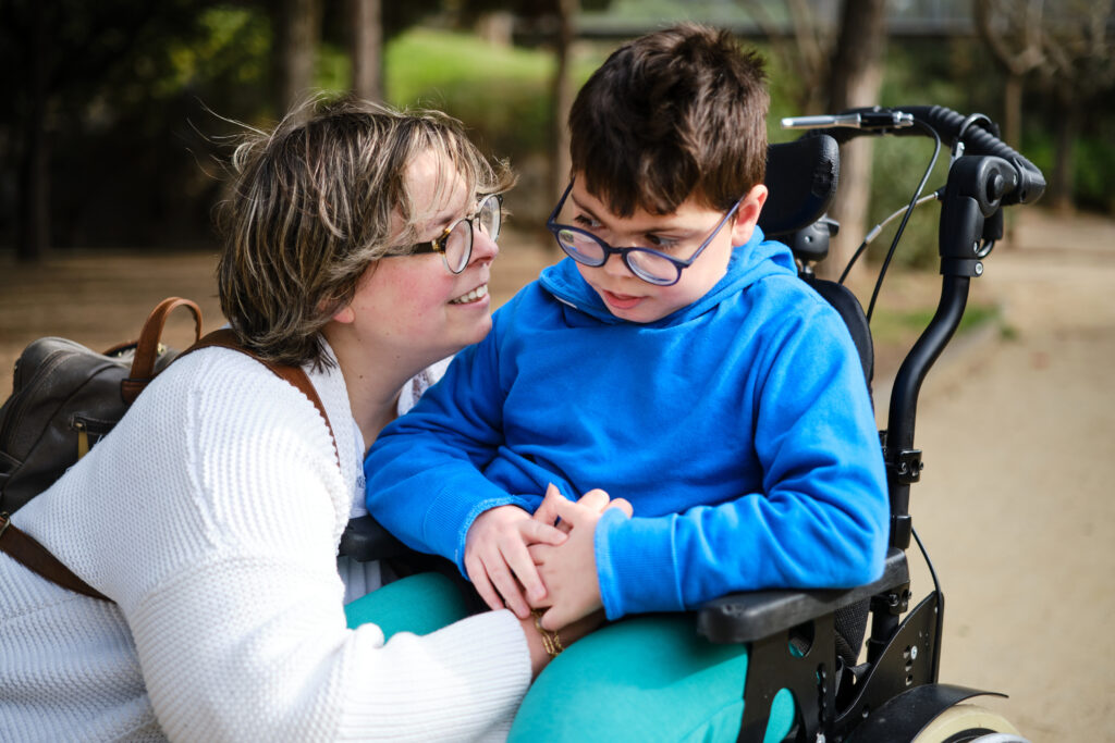 A person with their special needs loved one who is in the process of choosing a trustee for a special needs trust.