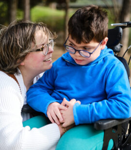 A person with their special needs loved one who is in the process of choosing a trustee for a special needs trust.